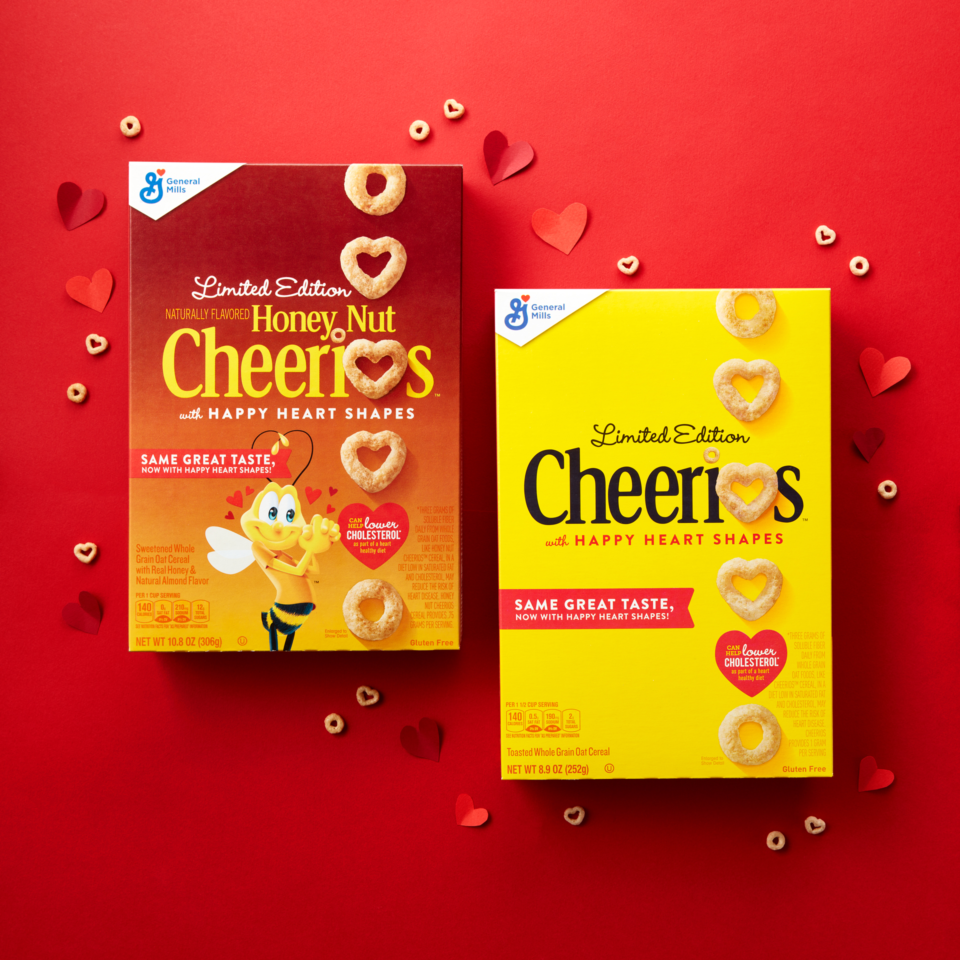 Cheerios heart shapes cereal boxes with red background