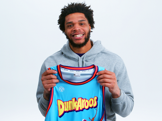 Miles Bridges holding Dunkaroos jersey