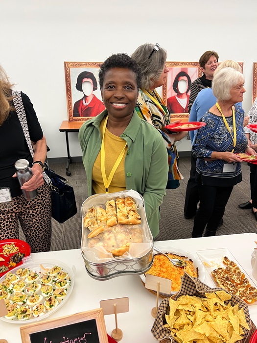 Karen Blanchard posing with her Caramelized Onion Focaccia