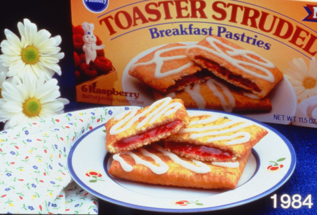 Promotional image of raspberry Toaster Strudel pastry and packaging