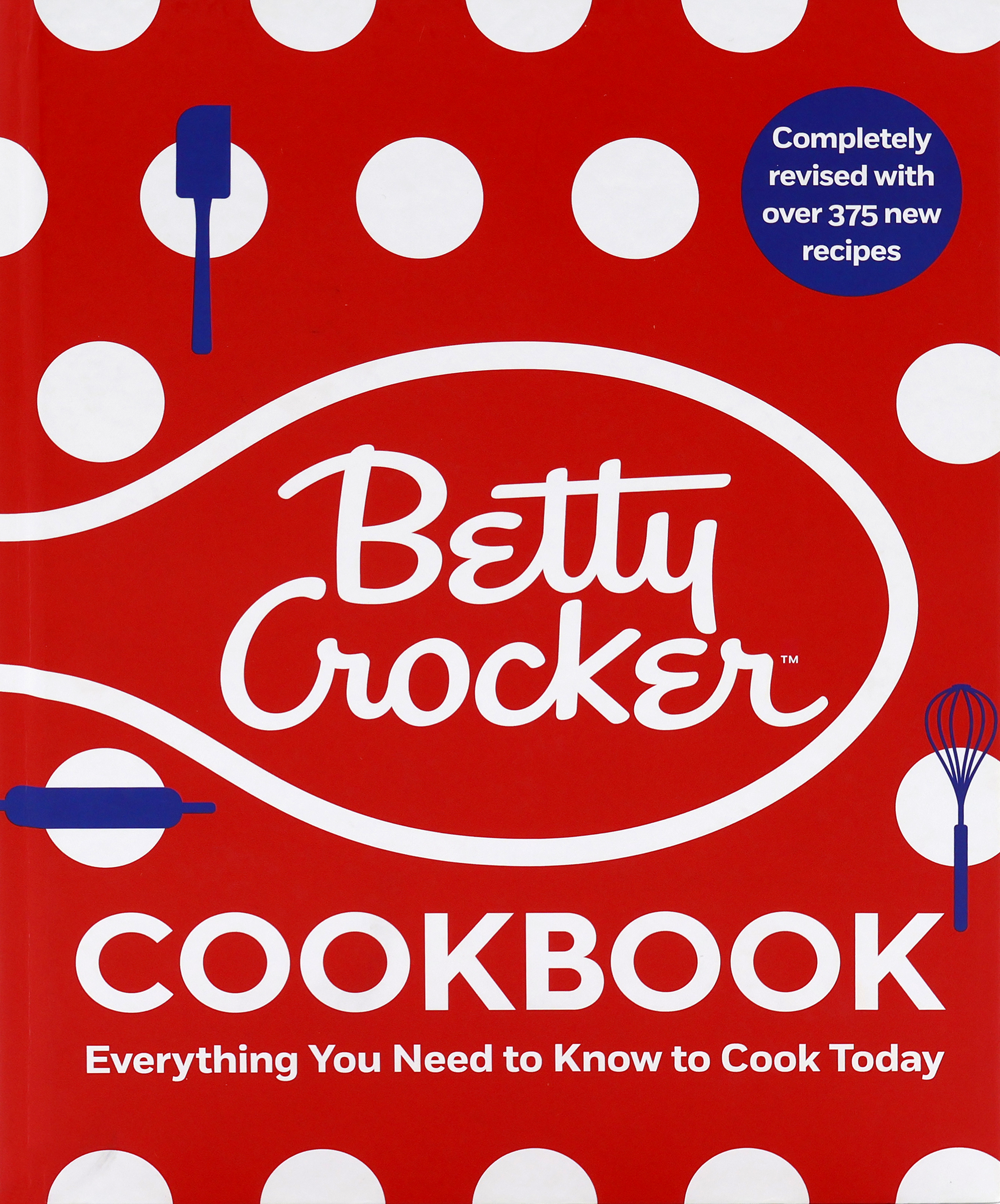 Cover of the 2022 Betty Crocker Cookbook with a red cover with white polka dots and navy blue illsustrations of cooking utensils (spatula, rolling pin, and whisk). The Betty Crocker spoon logo is large and centered in white with the words ”Cookbook” in all caps and ”Everything You Need to Know to Cook Today” written below it in white.